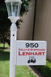 Lighted post sign in white