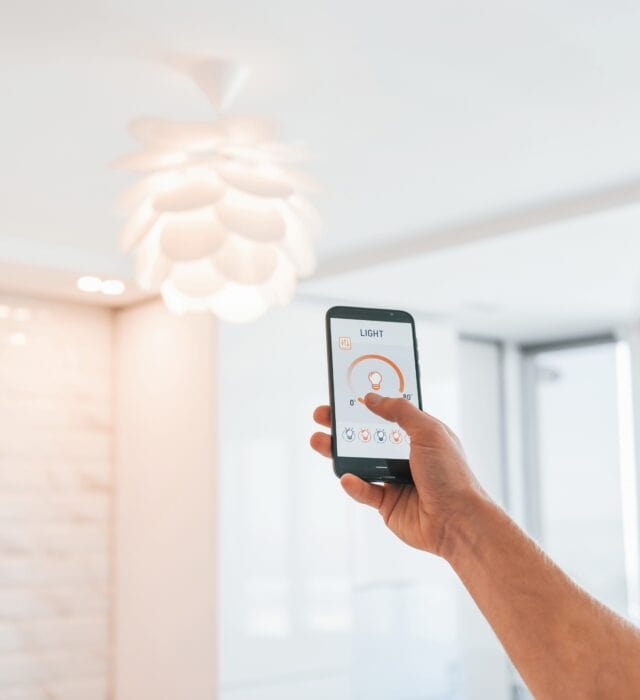 Controlling home interior light fixture with smart phone app.